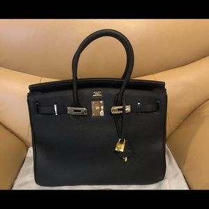 Black tote with lock and key